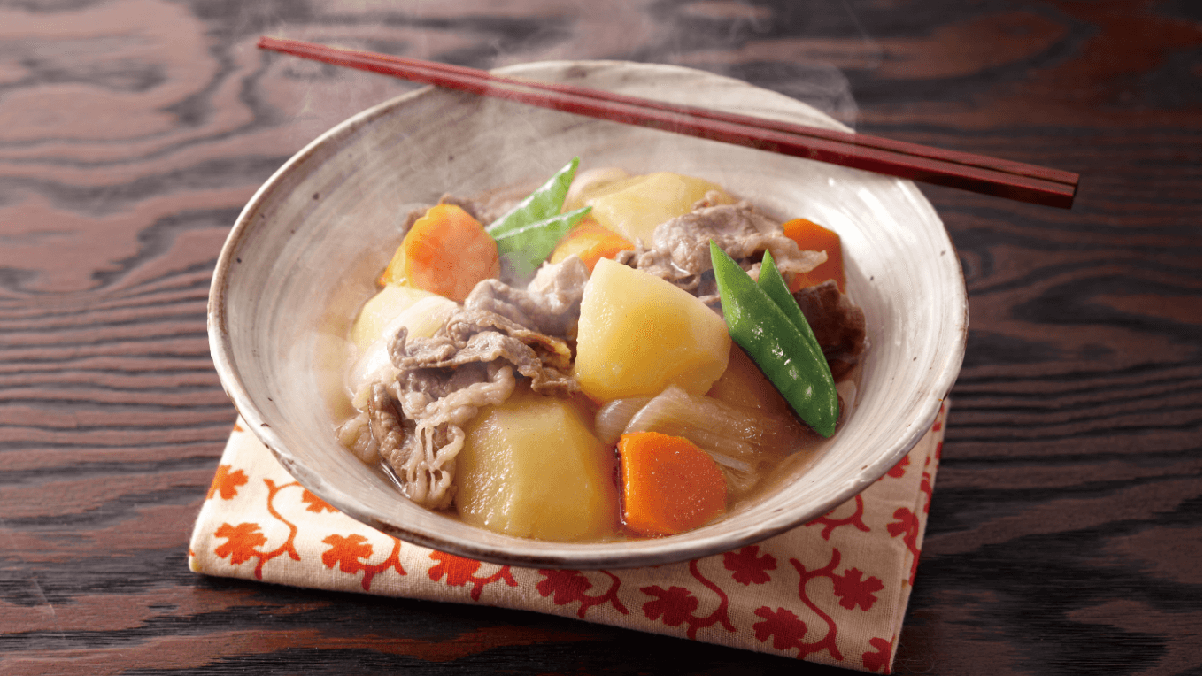 Boiled meat and potatoes with soy sauce and sugar