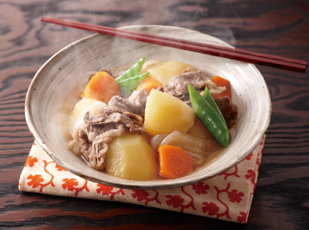 Boiled meat and potatoes with soy sauce and sugar