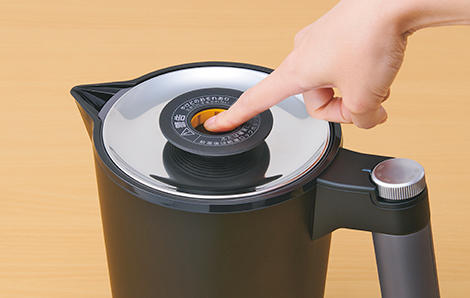 Dispense lock button