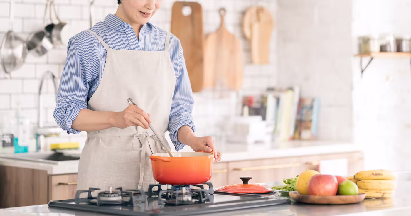 A woman cooking in the kitchen